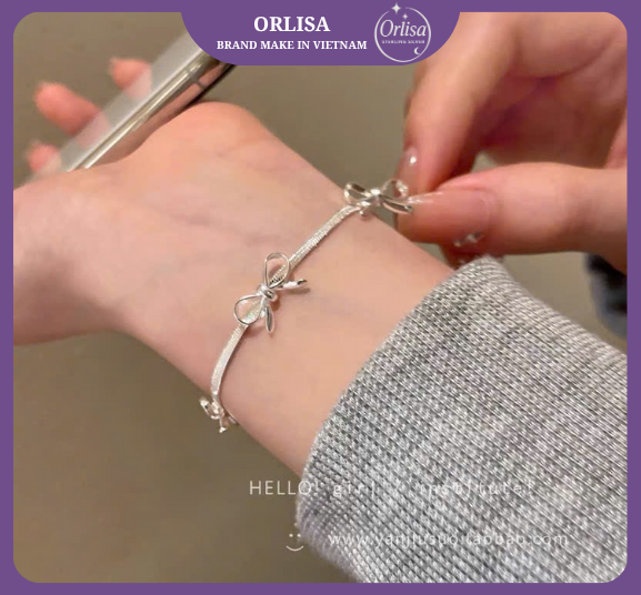 Lắc tay mảnh đính nơ bạc thương hiệu ORLISA0